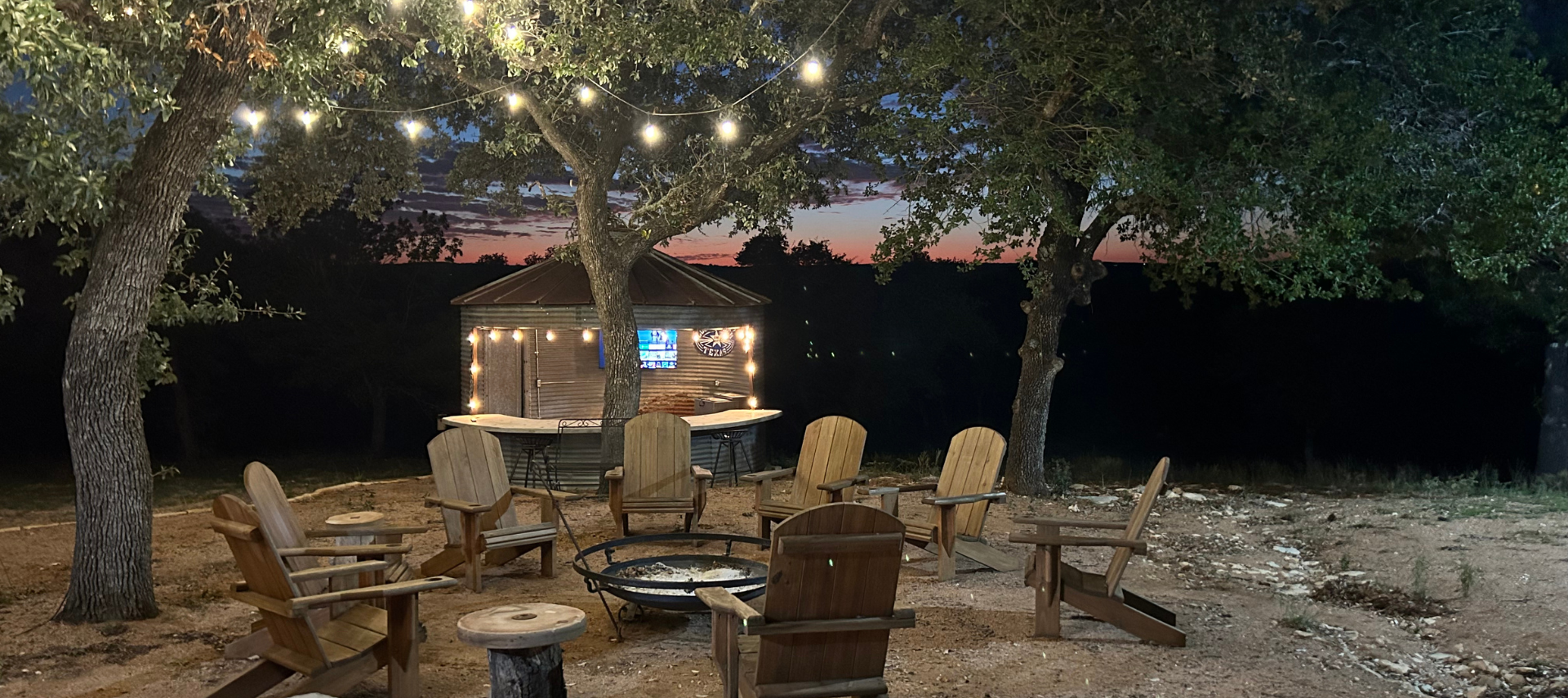 Image of outdoor firepit and silo barn at Inn at Sunset Mill Ranch