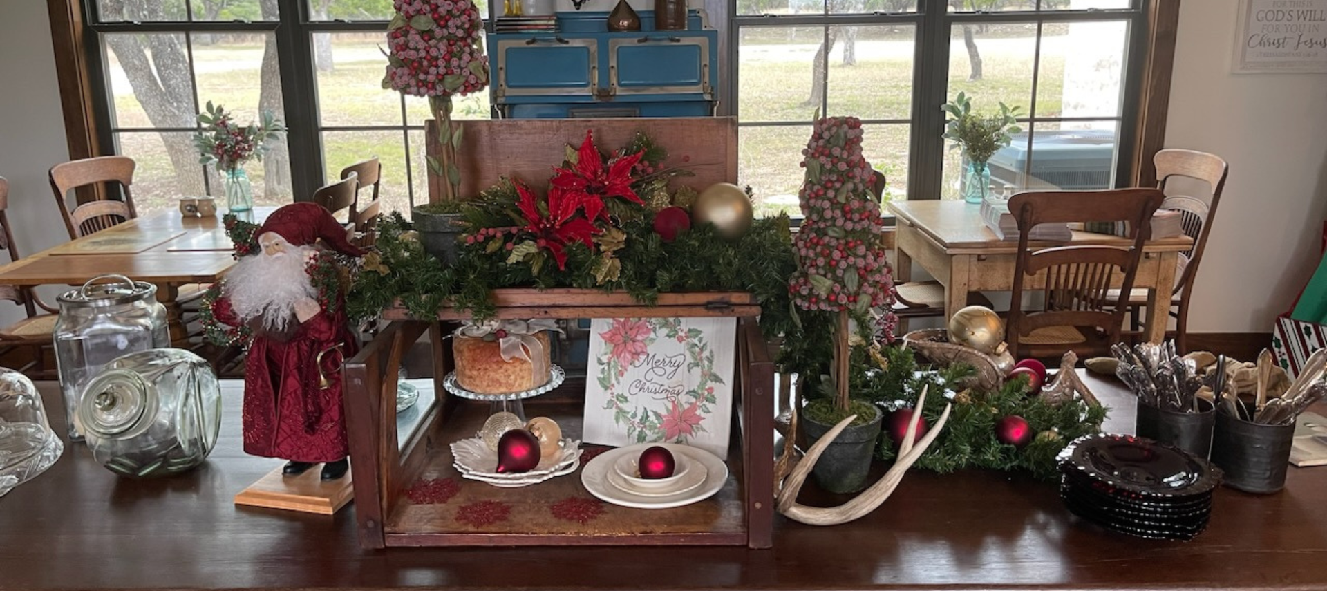 Image of Christmas decor and treats on dining table at Inn at Sunset Mill Ranch in Wimberley Texas