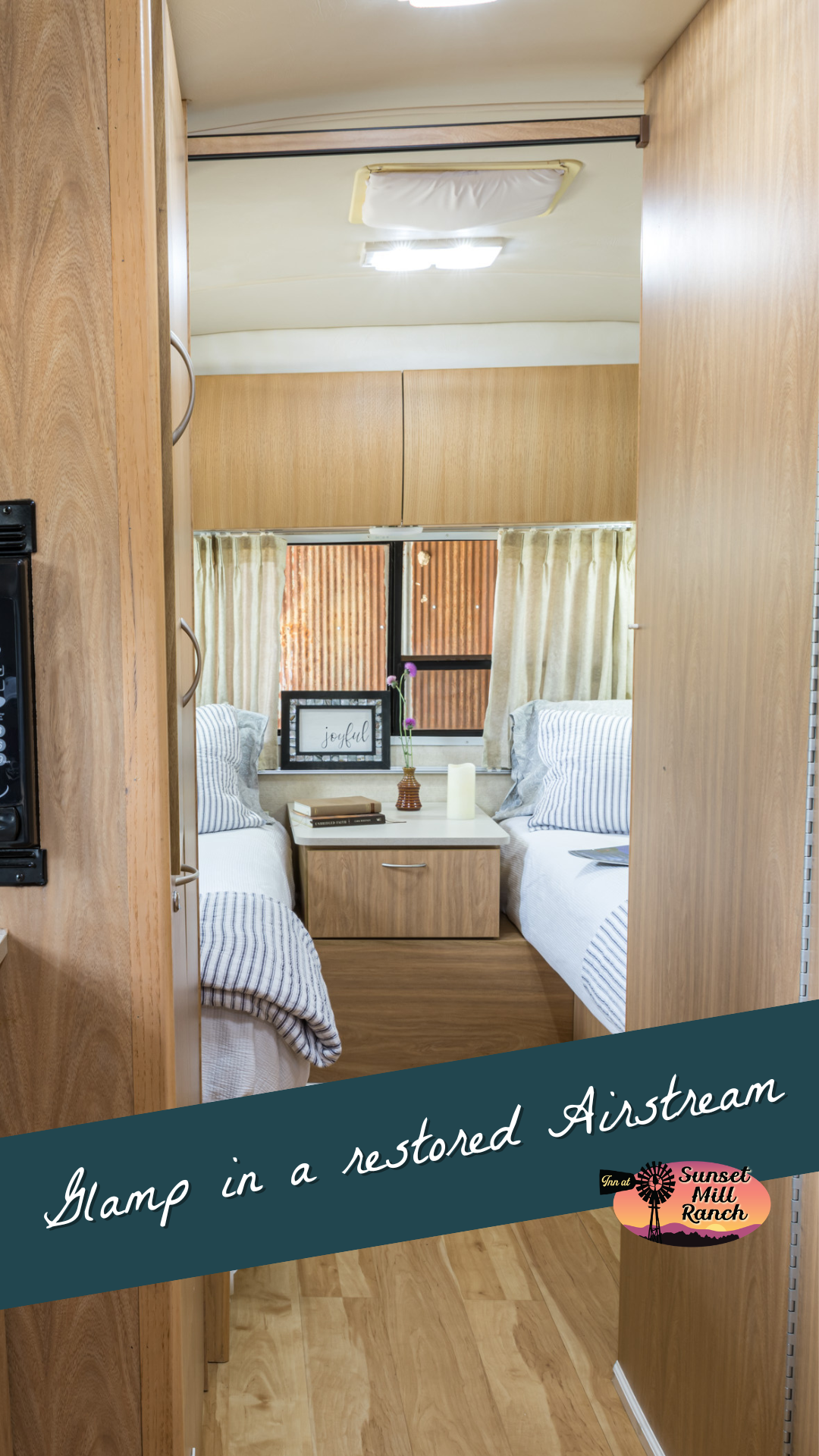 Image of inside of airstream glamper from kitchen looking into bedroom