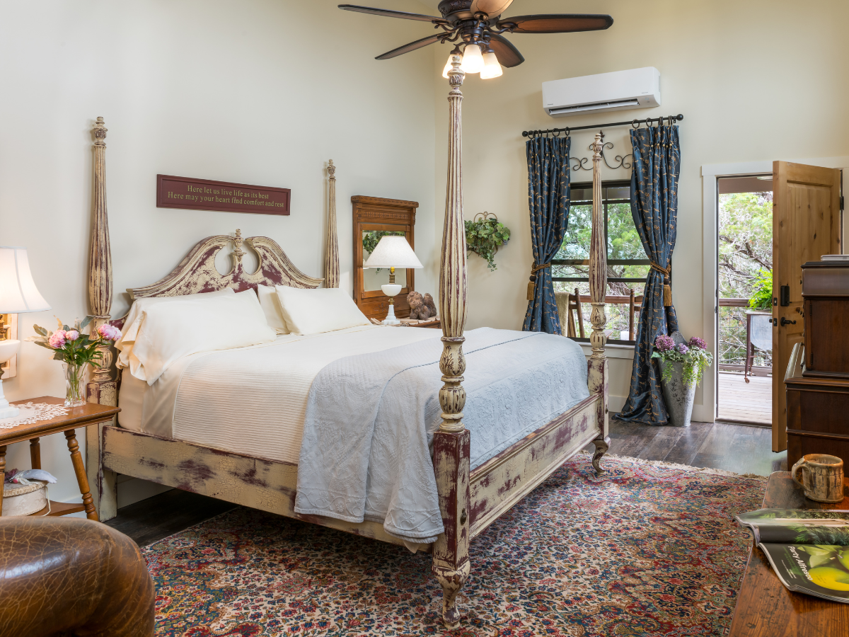 Image of four poster bed and wimberley bed and breakfast inn at sunset mill ranch in Mill Room