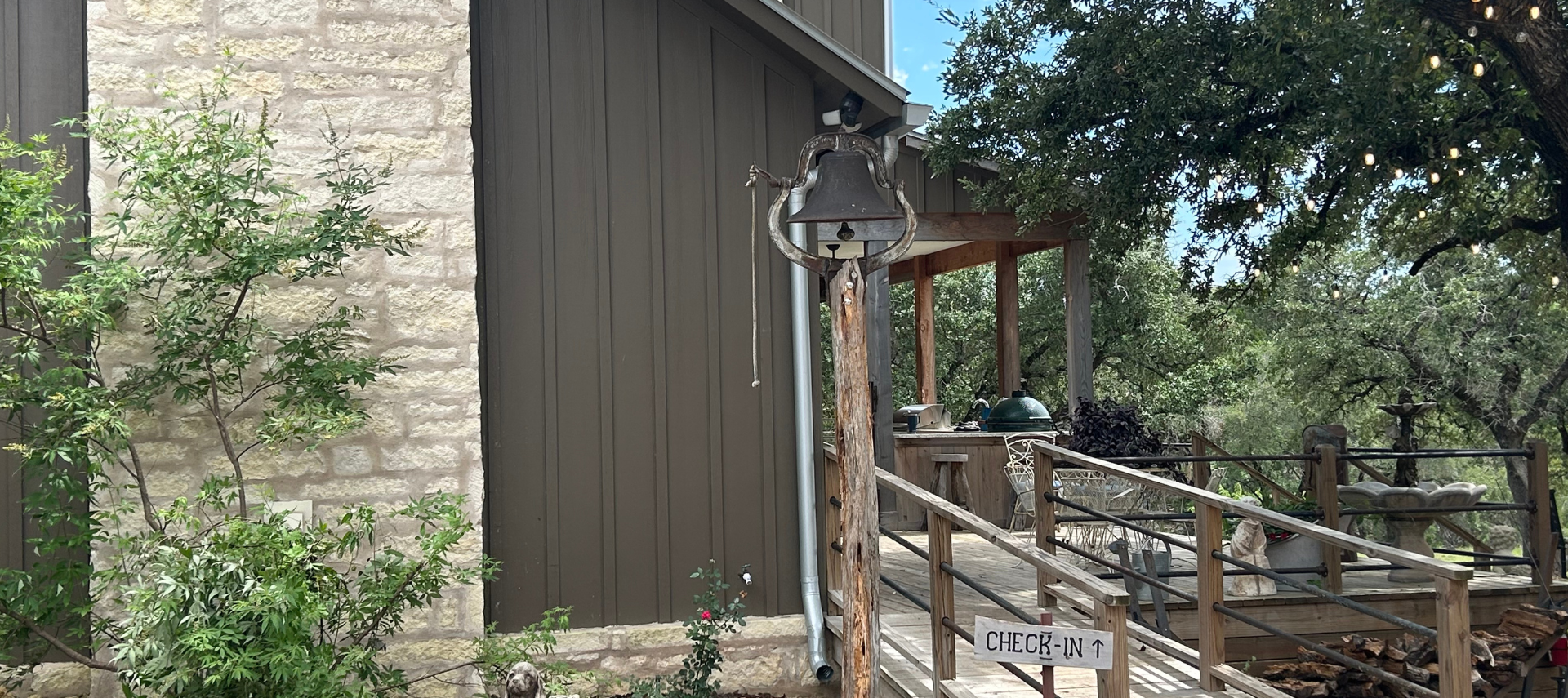 Image of the dinner bell at Inn at Sunset Mill Ranch in Wimberley Texas
