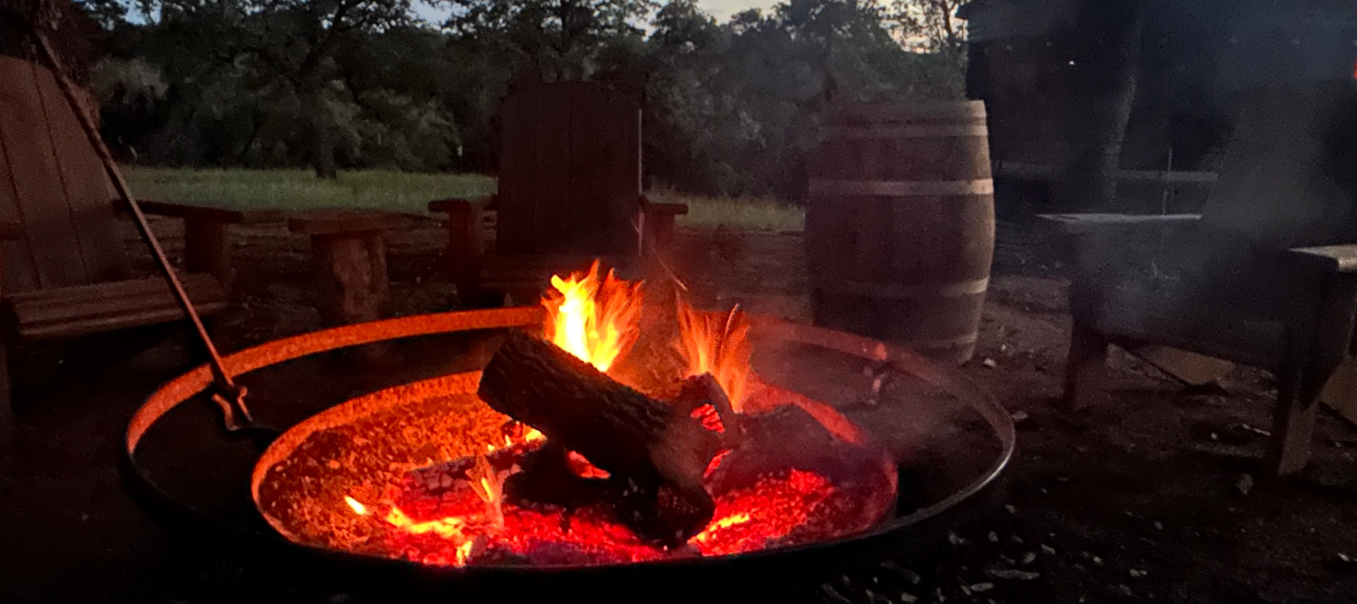 Image of firepite and adirondak chairs at inn at sunset mill ranch in wimberley tx