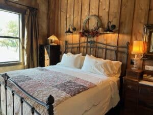 Granary Guest Room with Iron Bed and Luxury Linens
