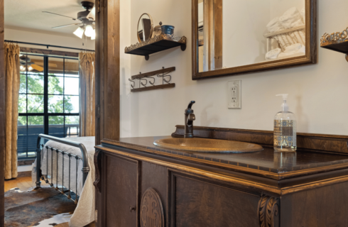 Image of Magnolia Home inspired vanity in Master Bath in the Winters Mill Cabin Accommodations at Inn at Sunset Mill Ranch in Wimberley Texas