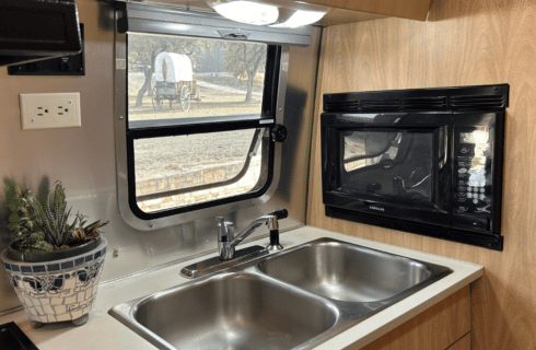 Image of Stainless Steel sink in airstream glamper at Inn at Sunset Mill Ranch